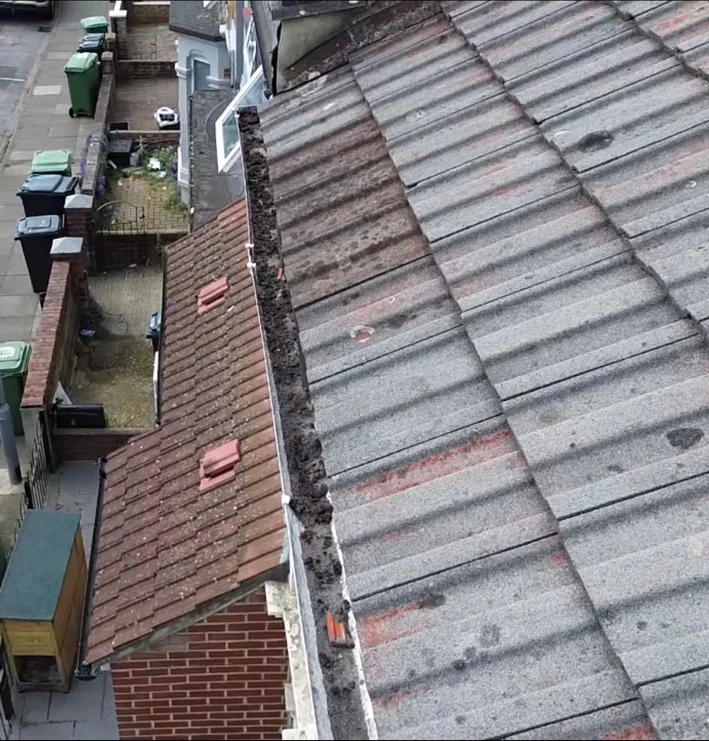Blocked valley gutter identified during a drone roof inspection